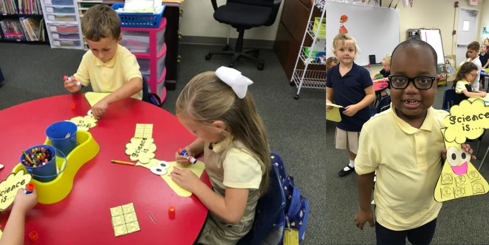 Students gather around a red table to complete their paper science project.