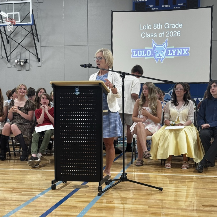 Kerrie Schneiter speaking during the awards promotion assembly