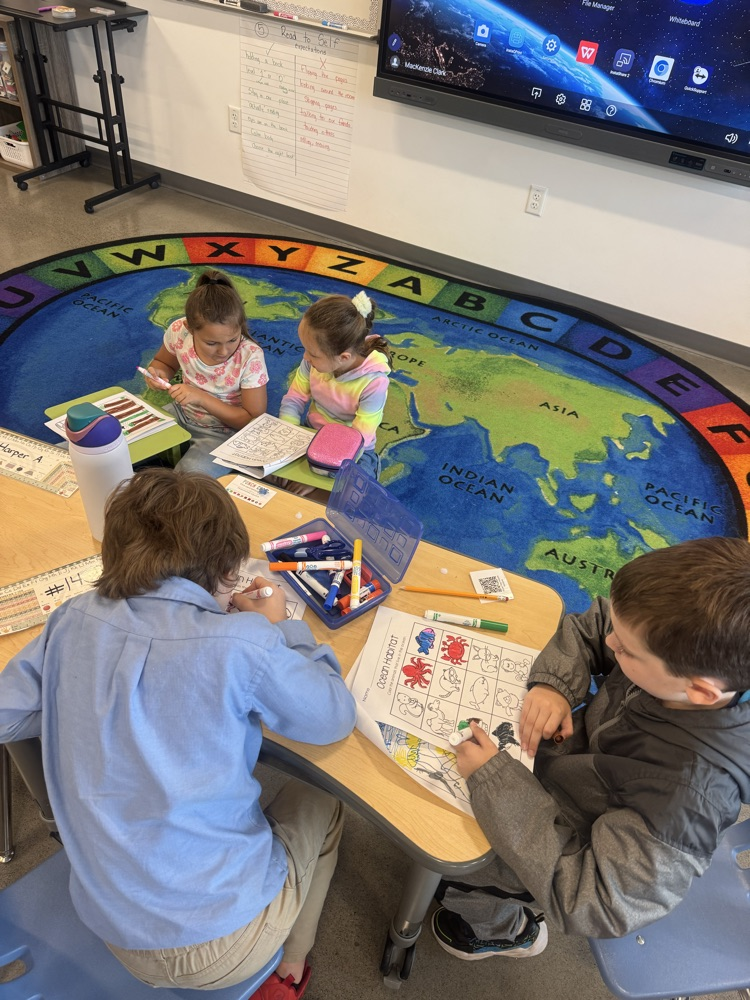 working hard on their pictures