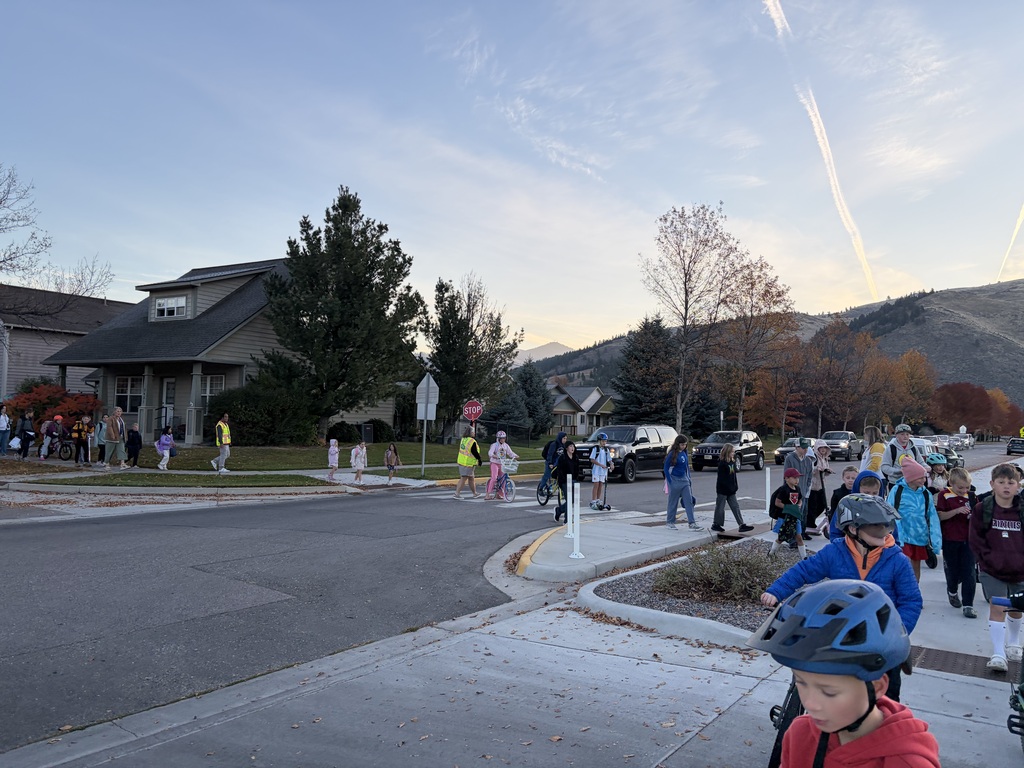 Lolo participating in Walk & Roll To School this morning.