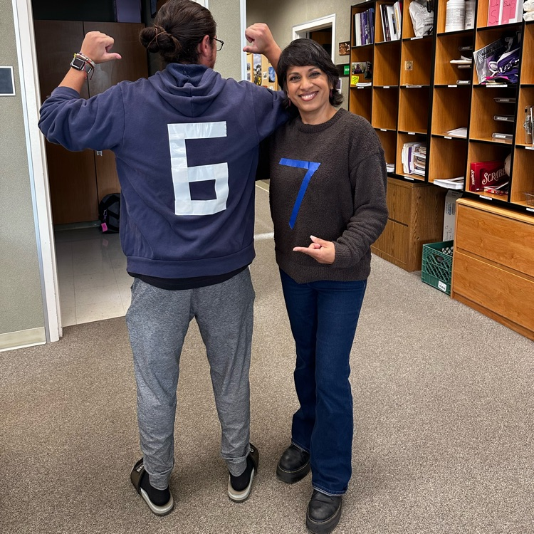 staff members wearing the number 6 or 7 on their shirts 