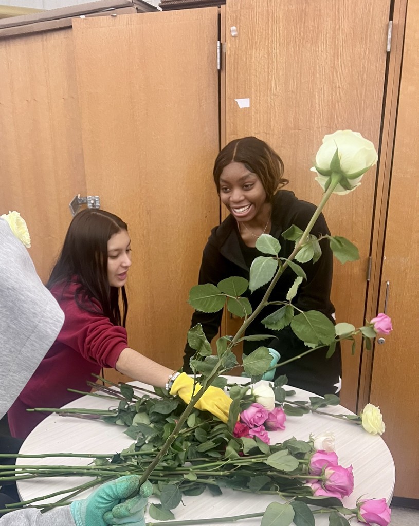 Leadership students prepared and organized roses for delivery.