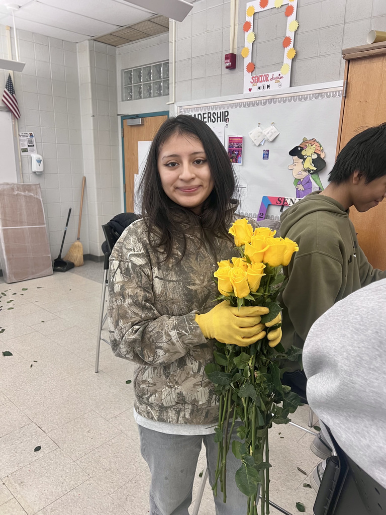 Leadership students prepared and organized roses for delivery.