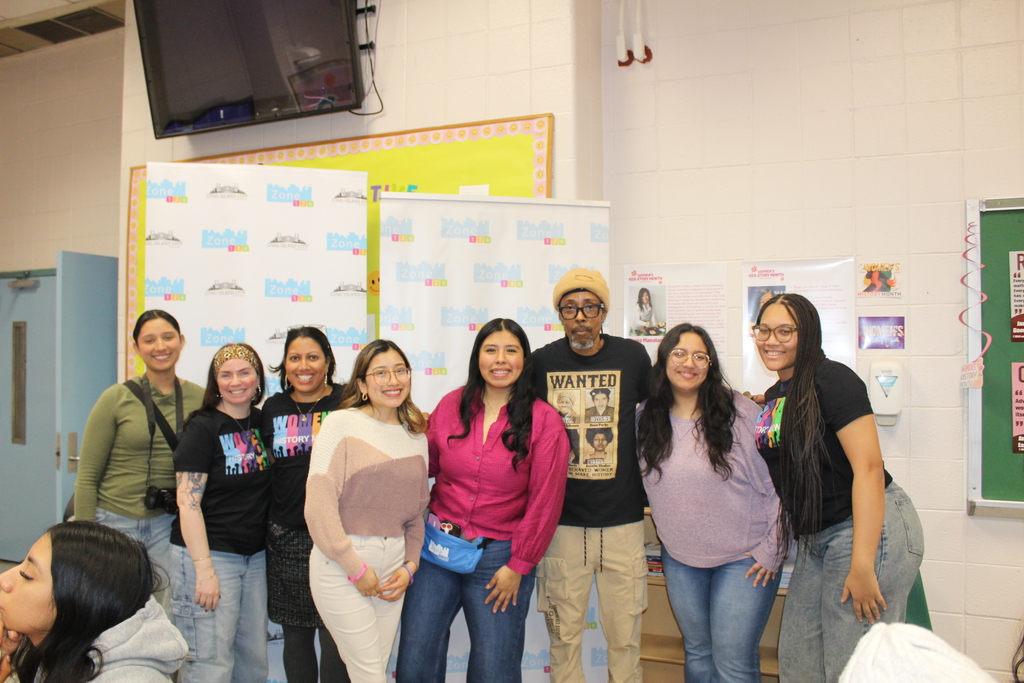 Zone staff pose for a photo at the Women's History Month Chat and Chew