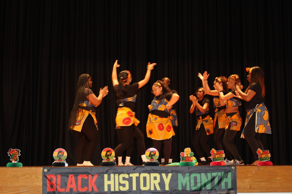 Students take the stage in vibrant performances of dance, poetry, and song, showcasing their talent and celebrating culture.