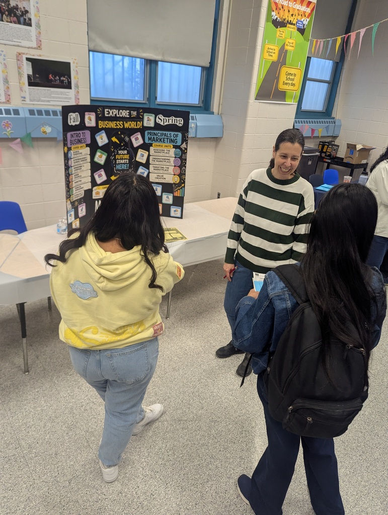 College Now Instructors talk to interested students regarding College Now Course Offerings at LICHS!