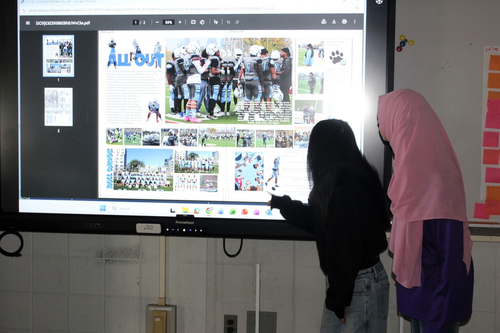 Students edit a Yearbook Spread.