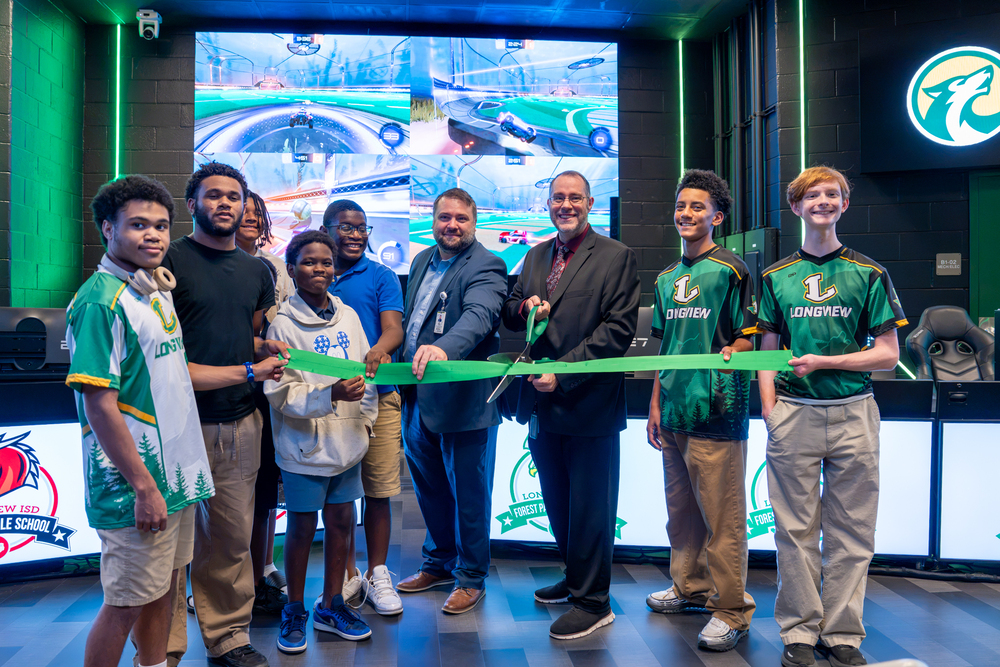 students and admin at ribbon cutting