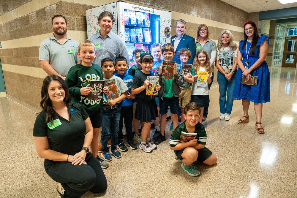 students and partners at vending machine