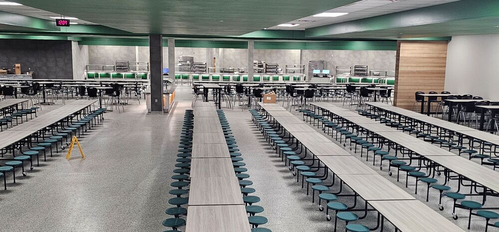 Rows of tables face new serving counters in Longview High School's renovated cafeteria.