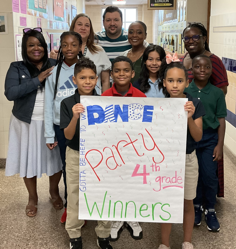 4th grade students and teacher with the Dance Party Winners sign