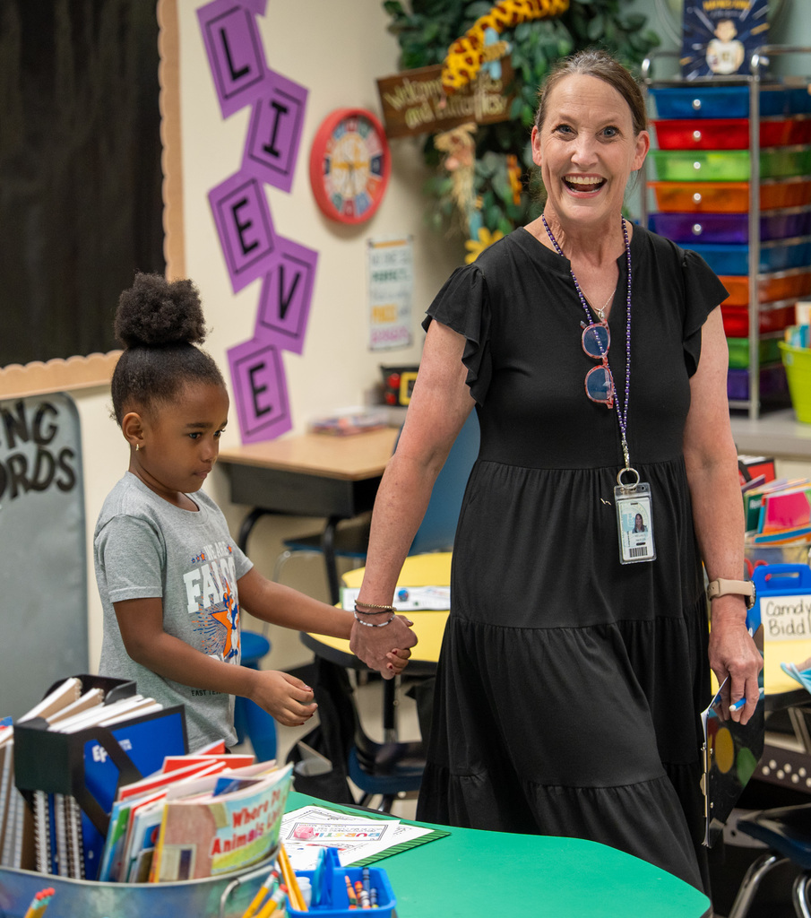 Mrs. Martin showing a new student around her classroom!