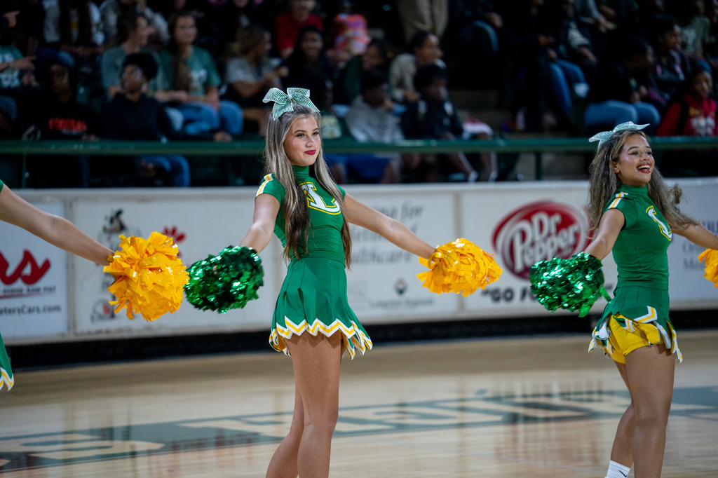 Cheerleader pumping up the crowd.