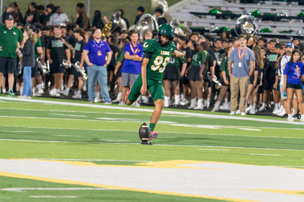 The Longview punter kicking the football to Lufkin.
