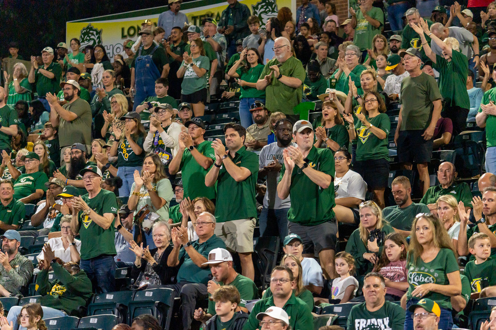 Longview fans clapping in the stands.
