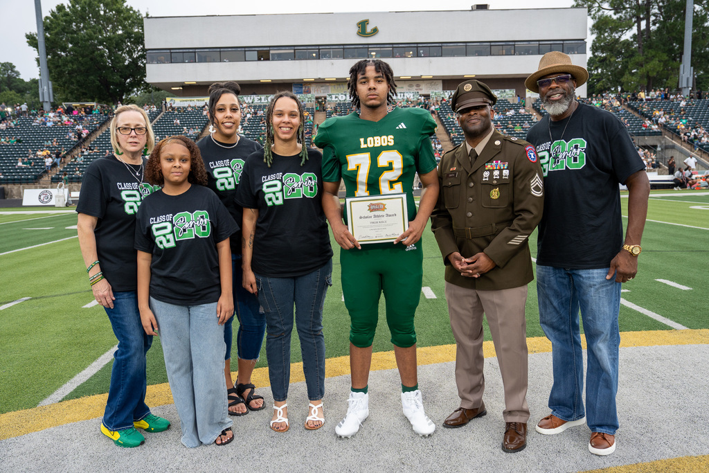 T. Reece celebrating Great American Rivalry Series Scholar Athlete