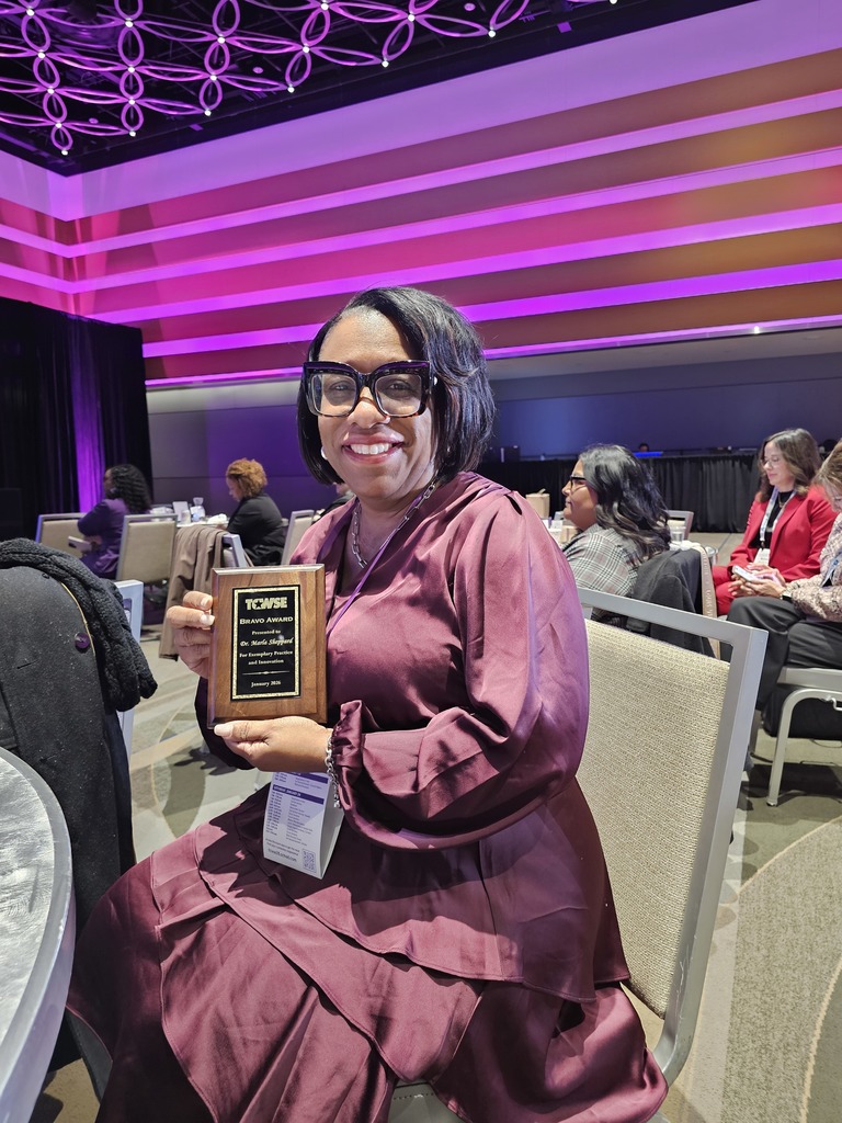 Dr. Sheppard with award