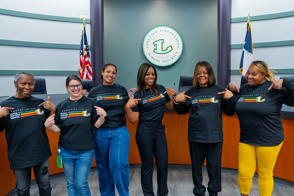 staff wearing black history tees 