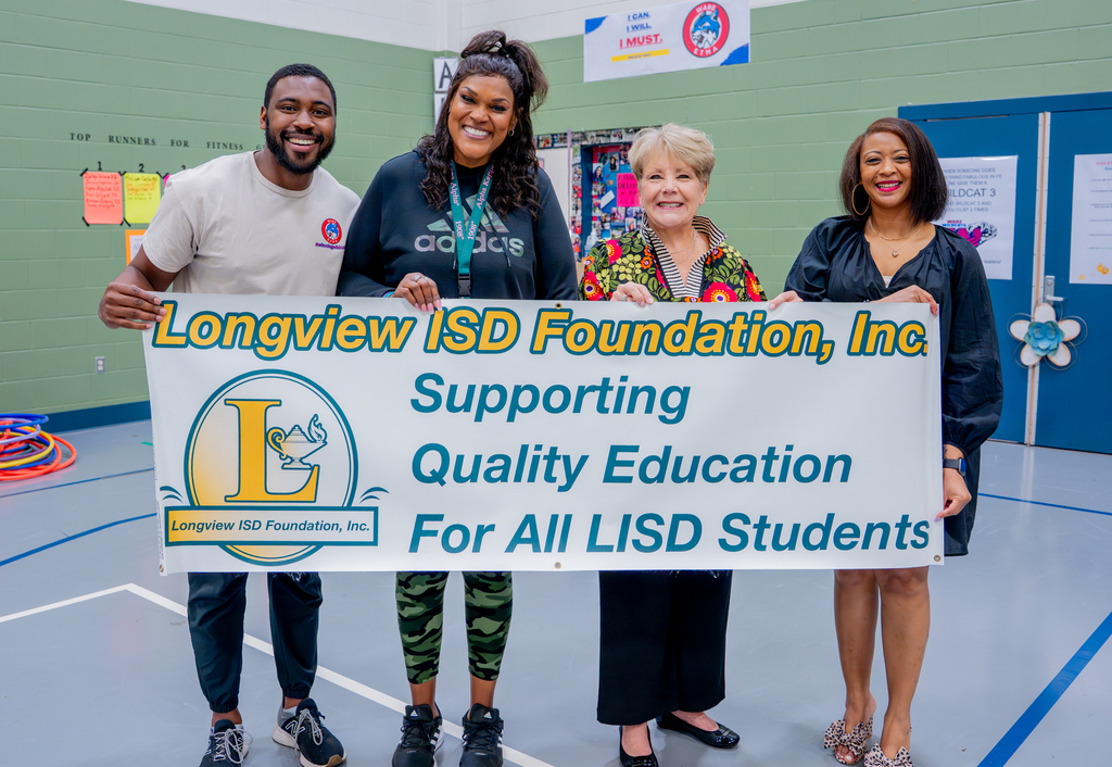 Ware PE Coaches being surprised with grant money!