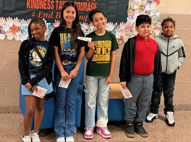 Photos of students with their prizes