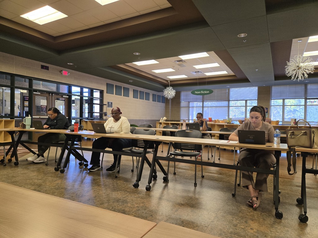 teachers taking a simulation test