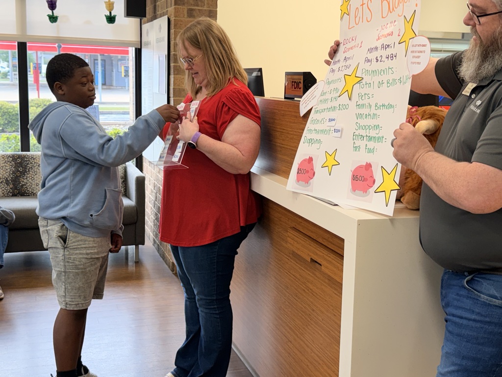 Ned E. Williams 5th Grade Students at Vera Bank Learning About Financial Literacy