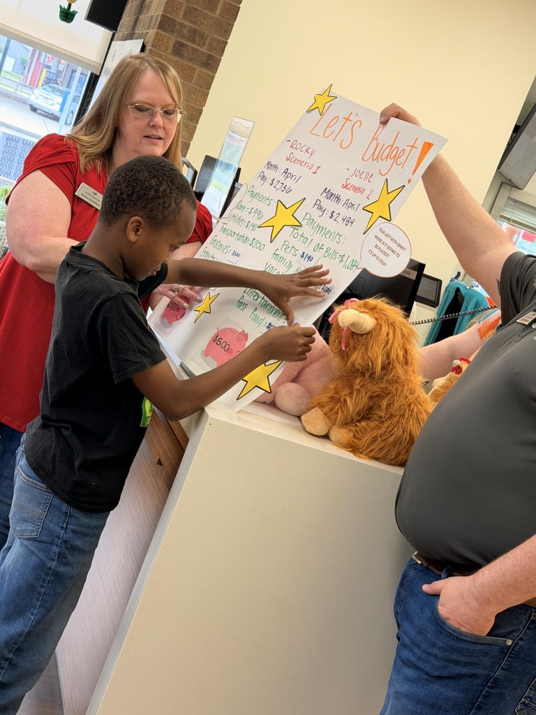 Ned E. Williams 5th Grade Students at Vera Bank Learning About Financial Literacy