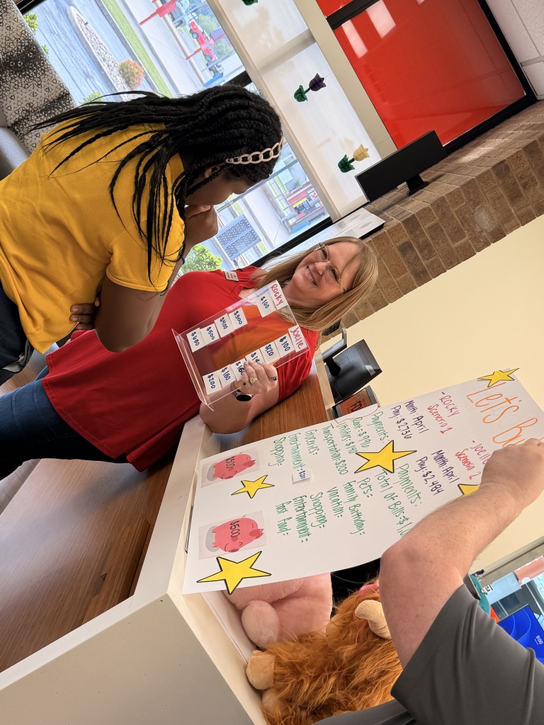 Ned E. Williams 5th Grade Students at Vera Bank Learning About Financial Literacy