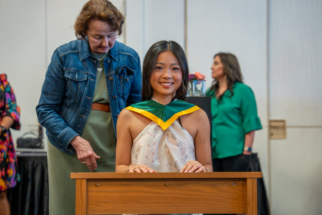 student being robed in IB