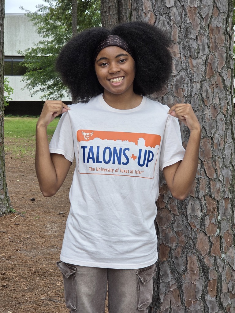 Grace Faulks wearing her Talons Up UT Tyler shirt to celebrate going to UT Tyler for accounting.