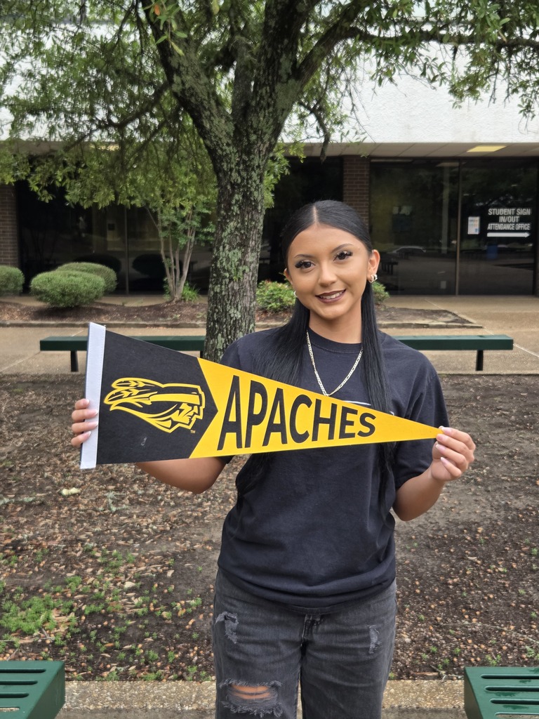 Jayleen is holding a Tyler Junior College pennant