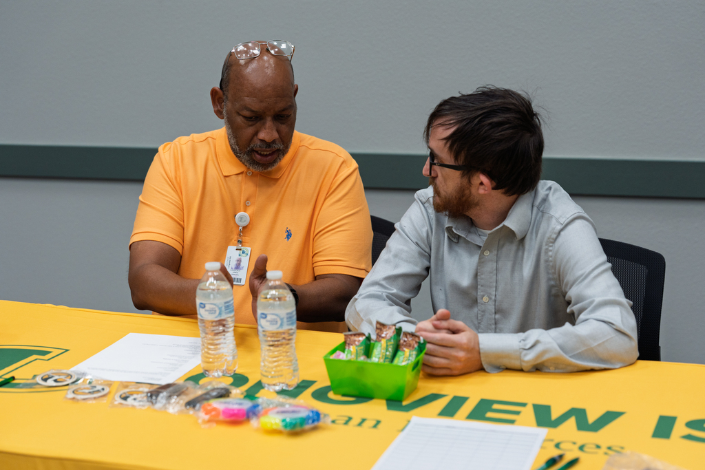 Man giving another man advice
