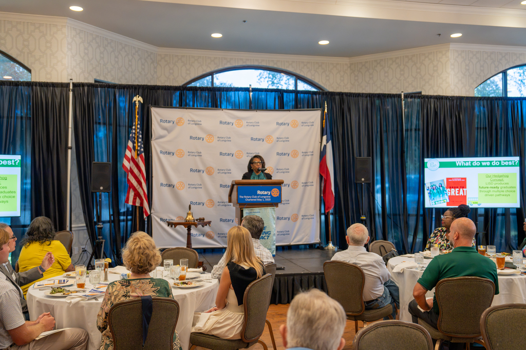 Dr. Sheppard as guest speaker at Longview Rotary meeting.