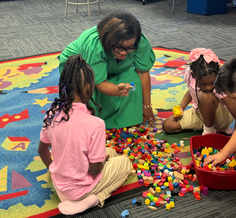 Sheppard with students