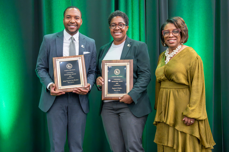 Alumni Toysha L. Walker and Judge Demetrius Eric Blacklock pose with Dr. Marla Sheppard.