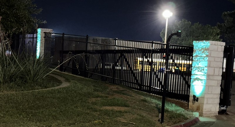 Entry View of Security Fence and Green Light