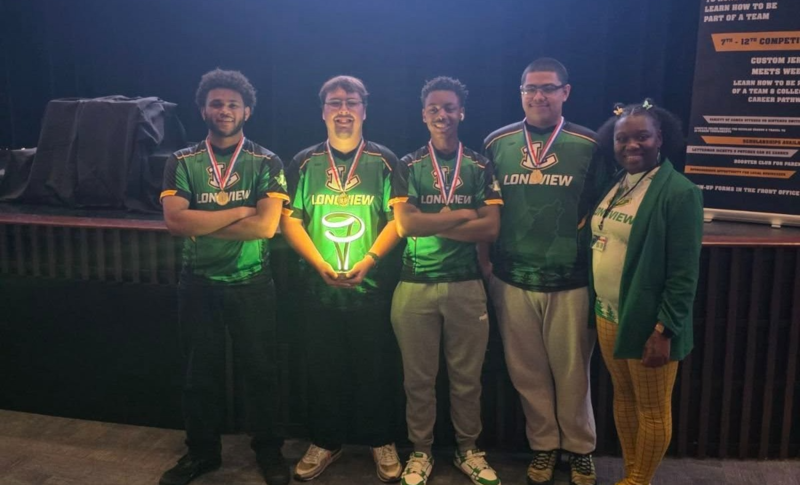 students with trophy