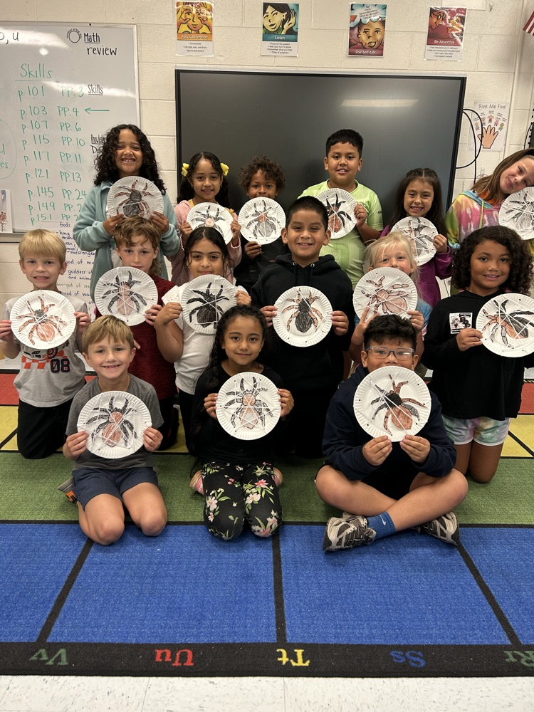 second grade class with Arachne’s spider webs