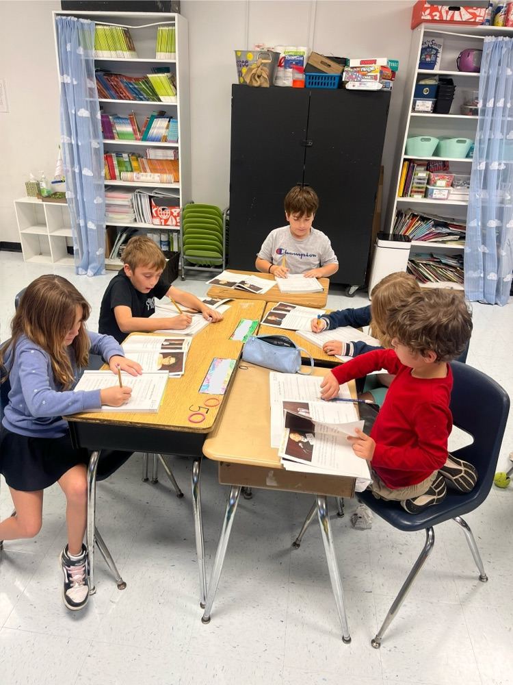students reading and working