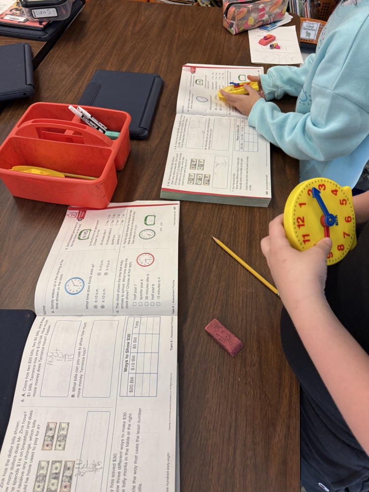 students telling time