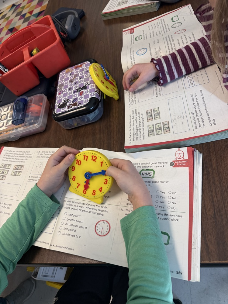 students telling time