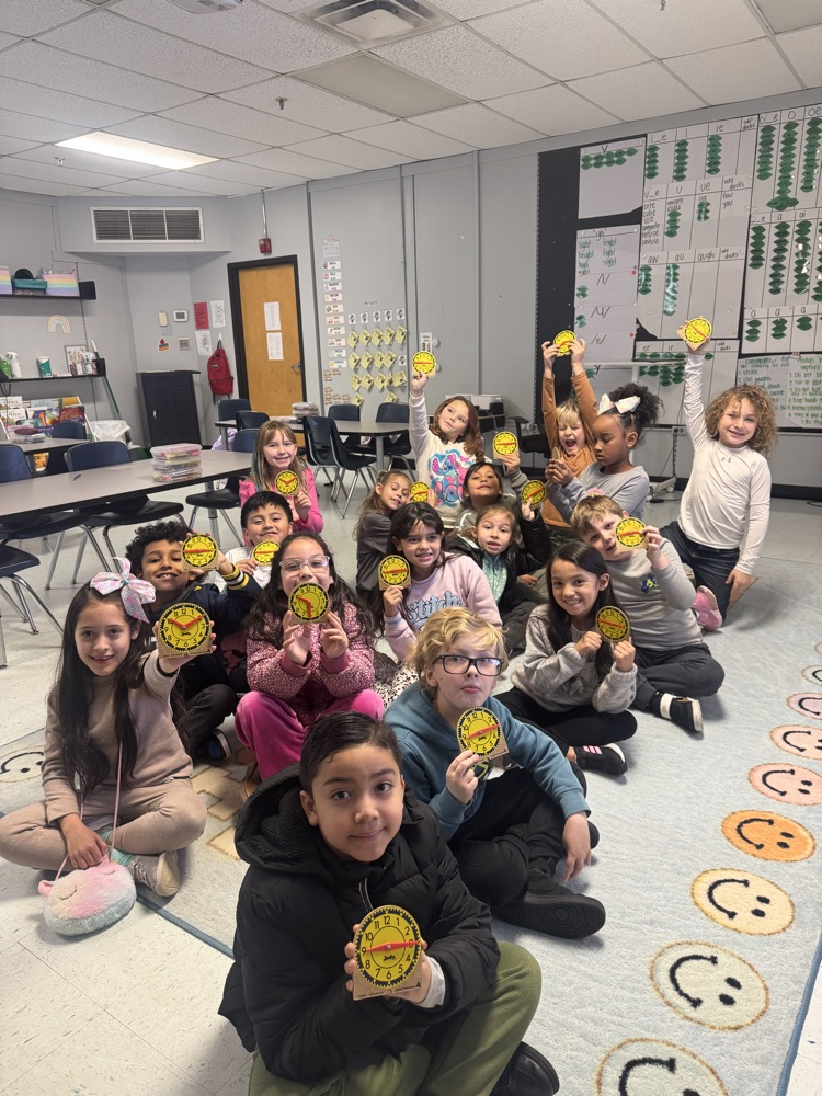 students telling time