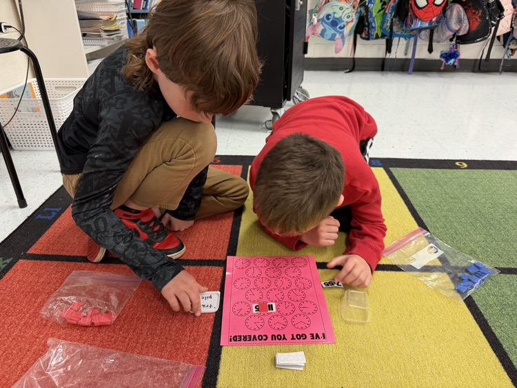 students telling time