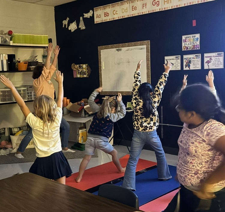 volunteer working with students