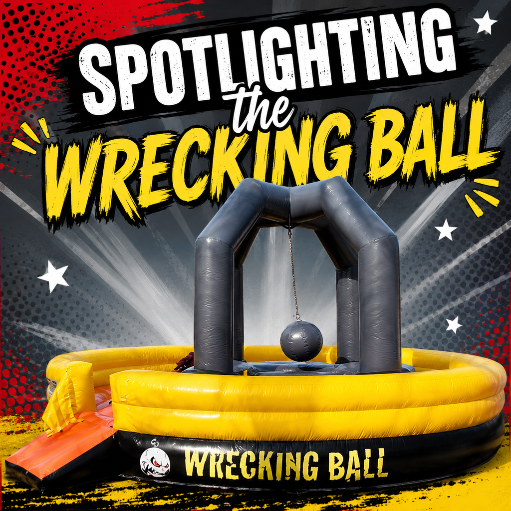 Advertisement for "Spotlighting the Wrecking Ball" with a yellow, black, and gray inflatable ride.