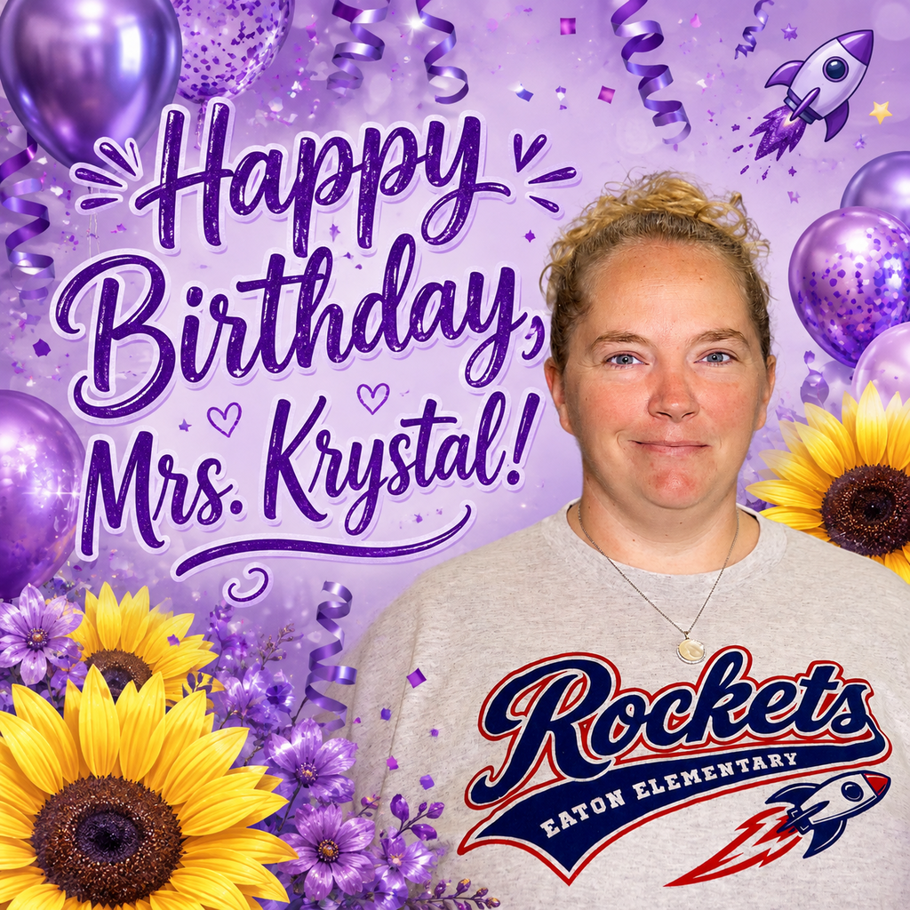 A woman smiles for a photo with a birthday message, balloons, and flowers in the background.