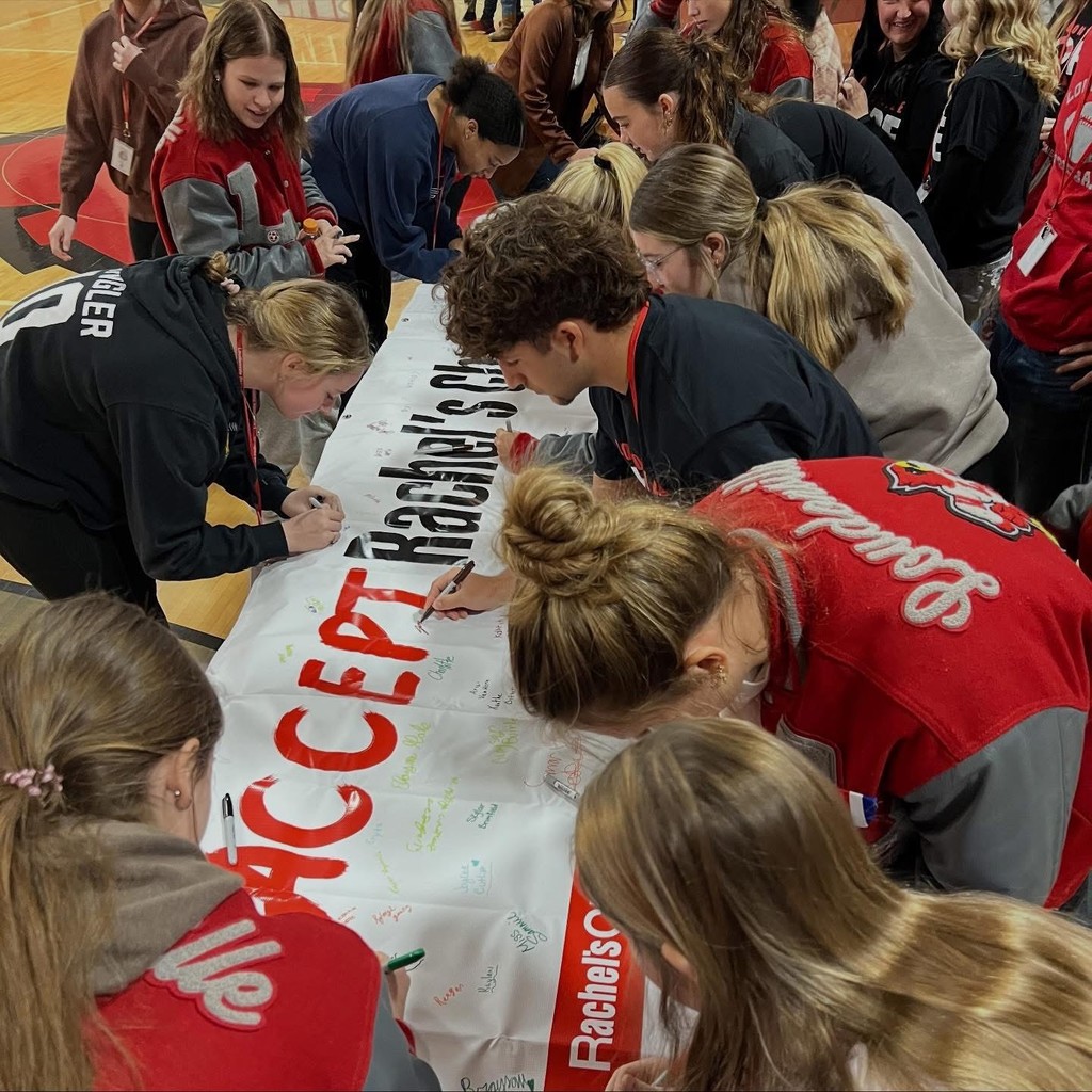 LHS students signing Rachel's Challenge Banner