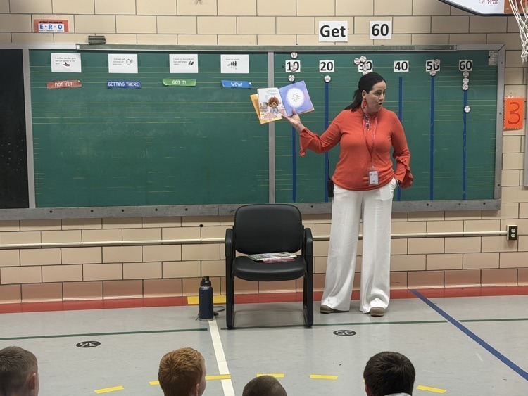 Superintendent Allerding reading to students