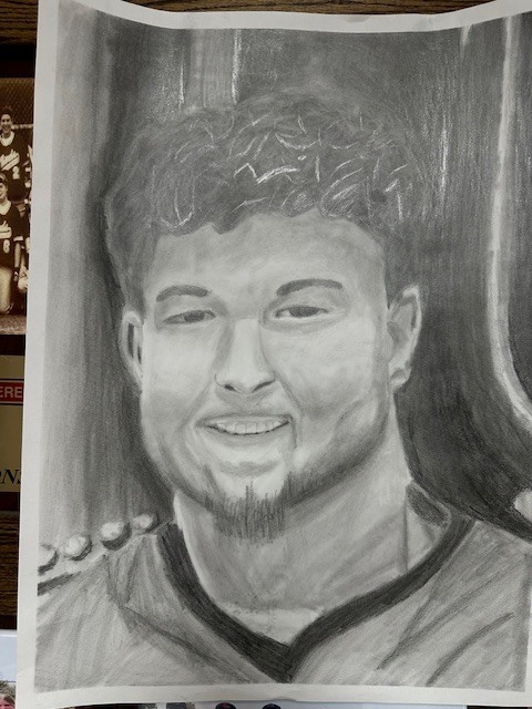Hand drawn self portrait of a young man.