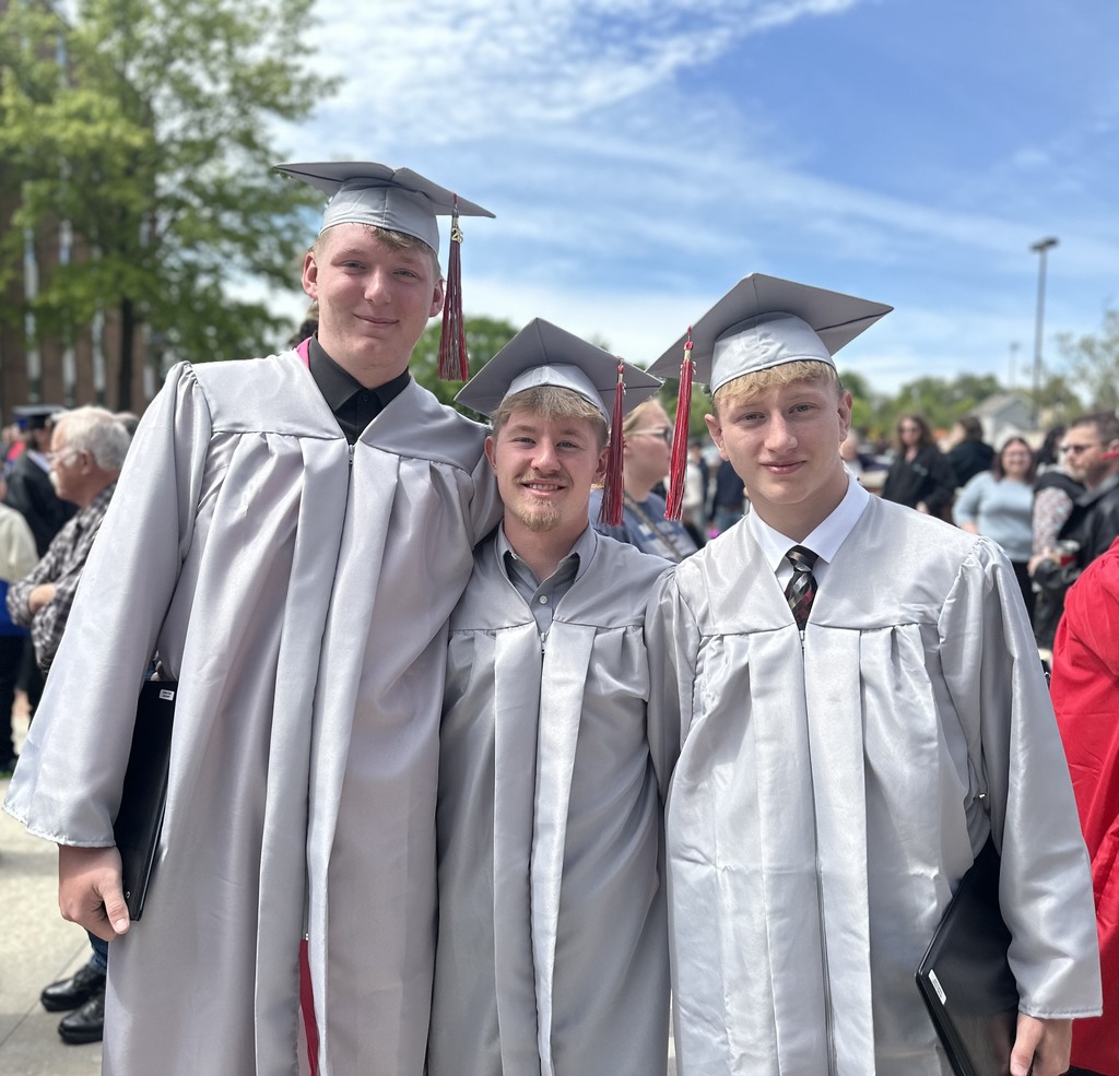 Photo of three male graduates